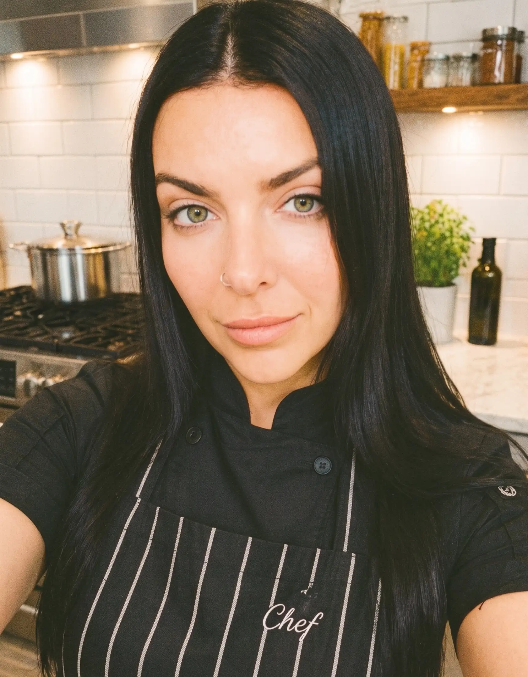 Chef Keren Biton preparing a dish
